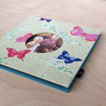 Leporelló védőtokkal - türkiz - sárga pillangós