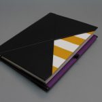 A/5 fekete - okkersárga -fehér csíkos - lila boríték napló cserélhető belívvel 