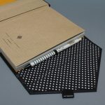 A/5 fekete -fehér pöttyös - okkersárga boríték napló cserélhető belívvel 