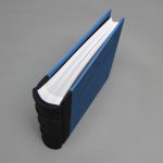 Fekete farmer - kék vászon fotóalbum